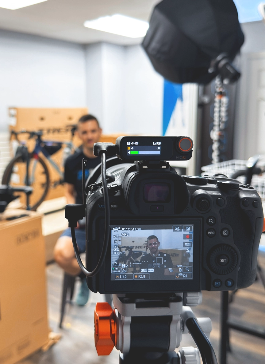 Local marketing agency for small business filming video content on-site